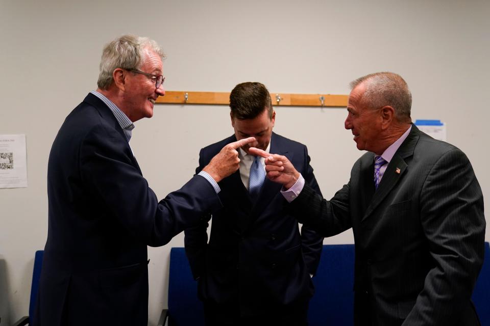 (from left) Gov. Phil Murphy speaks with Kevin McCabe, Middlesex County democratic chairman, and Ronald Rios, Middlesex County commissioner director backstage during the Middlesex County business summit on Sept. 26, 2023, in New Brunswick.