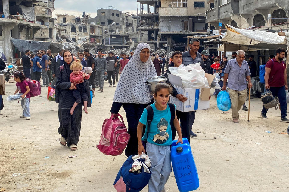 Displaced Palestinians make their way as they flee areas in northern Gaza Strip following an Israeli evacuation order, amid the Israel-Hamas conflict, in Jabalia, Oct. 6, 2024. / Credit: Hussam Al-Zaanin/REUTERS