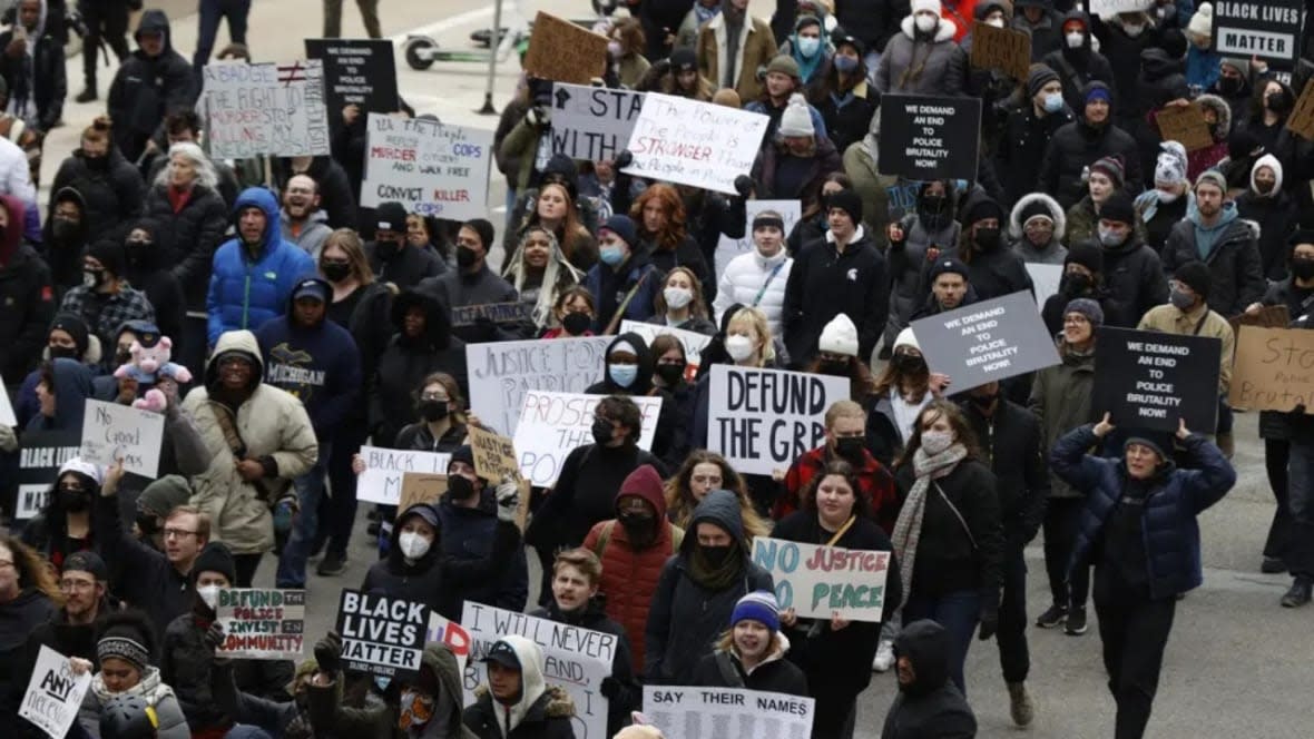 In this April 16, 2022 photo, a crowd of over 300 people protest the killing of Patrick Lyoya in Grand Rapids, Michigan. The 26-year-old Congolese refugee was fatally shot by a Grand Rapids police officer after resisting arrest during a traffic stop on April 4, 2022. (Photo: Eric Seals /Detroit Free Press via AP)