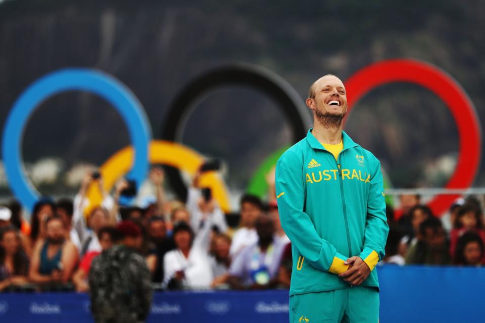 <p>Tom Burton of Australia celebrates winning the gold medal in the Men’s Laser class on Day 11 of the Rio 2016 Olympic Games at the Marina da Gloria on August 16, 2016 in Rio de Janeiro, Brazil. (Photo by Clive Mason/Getty Images) </p>
