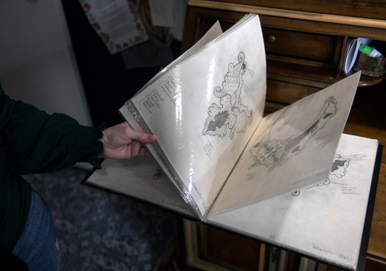 Dawna Gillespie shows her sketches for her jewelry in her home studio, Wednesday, April 24, 2024, in Ransom Canyon.