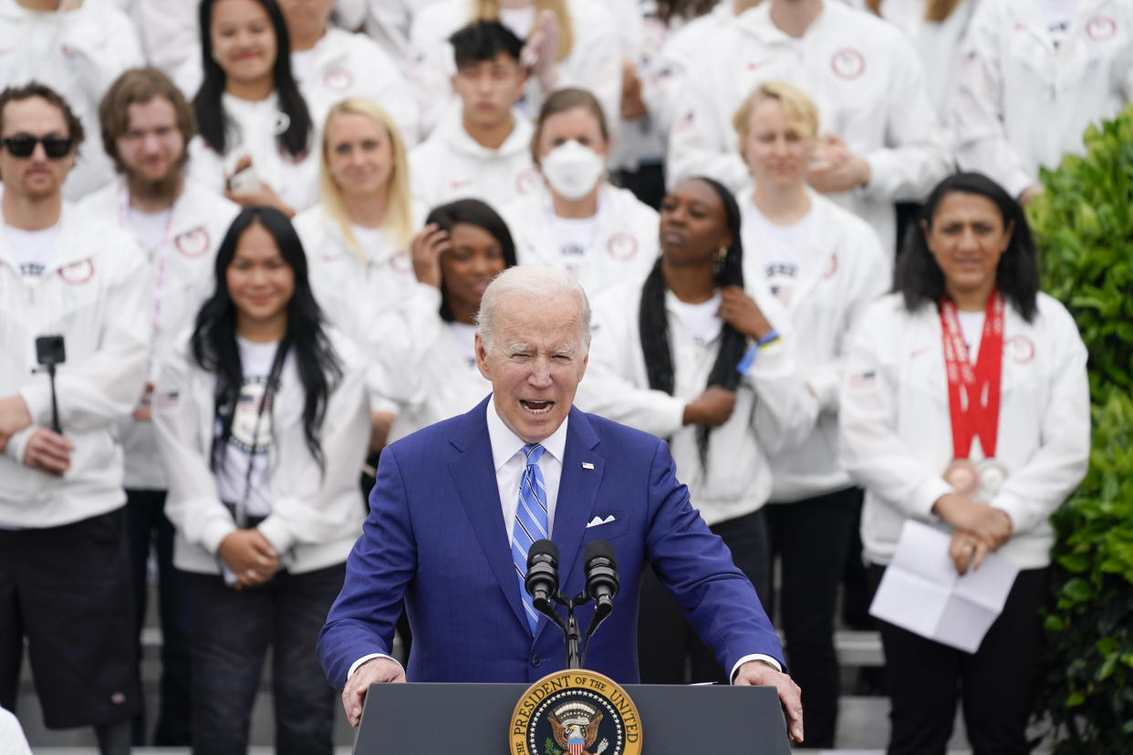 President Joe Biden speaks during an event with the Tokyo 2020 Summer Olympic and Paralympic Games, and Beijing 2022 Winter Olympic and Paralympic Games, on the South Lawn of the White House, Wednesday, May 4, 2022, in Washington. (AP Photo/Evan Vucci)