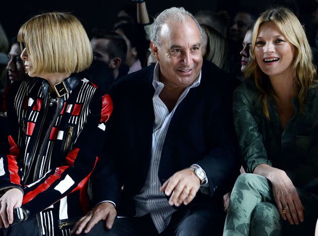 Anna Wintour, Sir Philip Green and Kate Moss attend the Topshop Unique show at London Fashion Week AW14 at Tate Modern on February 16, 2014 in London, England. (Photo: David M. Benett via Getty Images)