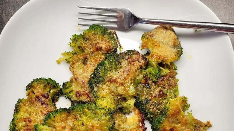 smashed broccoli covered in parmesan