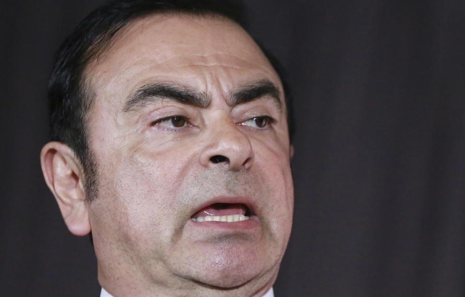 In this May 12, 2016, photo, then Nissan Motor Co. President and CEO Carlos Ghosn speaks during the press conference in Yokohama, near Tokyo. The children of former Nissan chairman Carlos Ghosn, who is under arrest in Tokyo, have defended their father's love for Japan and denounced comments by the Japanese automaker's chief executive. The statement from Caroline, Nadine, Maya and Anthony Ghosn, seen Monday, March 4, 2019 by The Associated Press, says Ghosn had affection and respect for Japan and Nissan Motor Co. (AP Photo/Eugene Hoshiko)