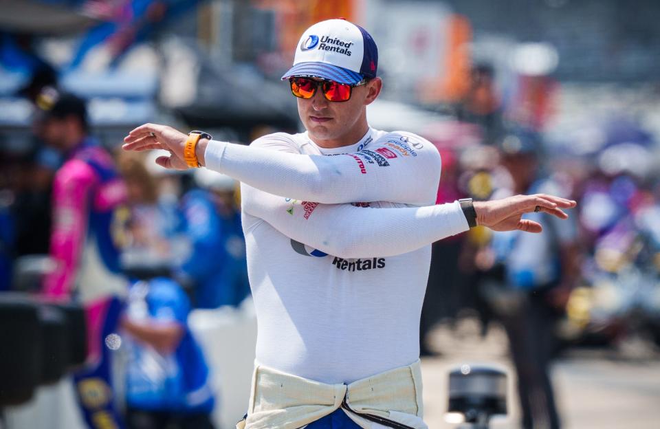 Rahal Letterman Lanigan Racing driver Graham Rahal stretches during Fast Friday practice at Indianapolis Motor Speedway in preparation for the 106th running of the Indianapolis 500.