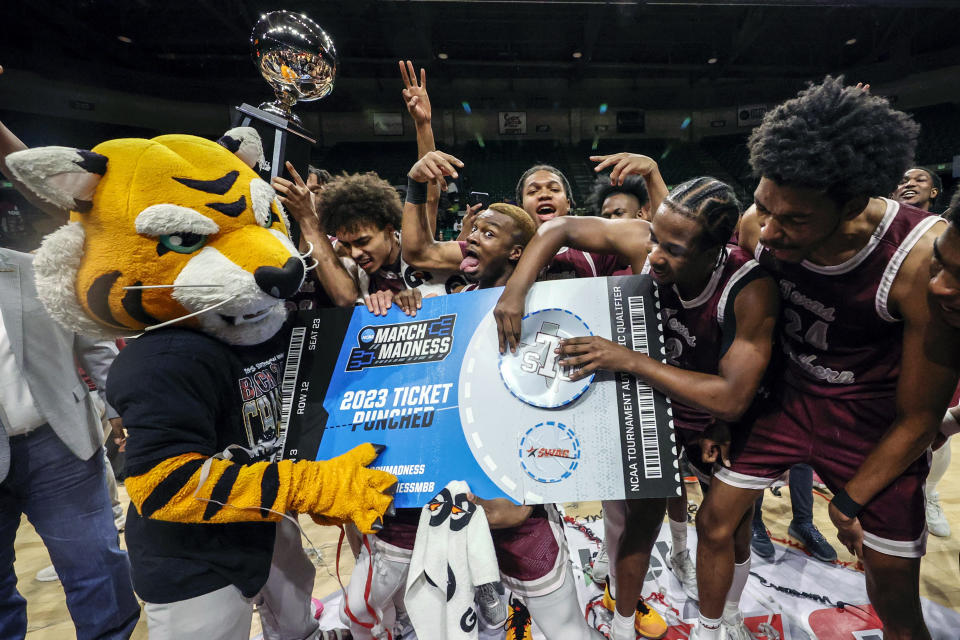 Texas Southern players punch their ticket to March Madness by defeating Grambling State in an NCAA college basketball game in the championship of the Southwestern Athletic Conference tournament, Saturday, March 11, 2023, in Birmingham, Ala. (AP Photo/Butch Dill)