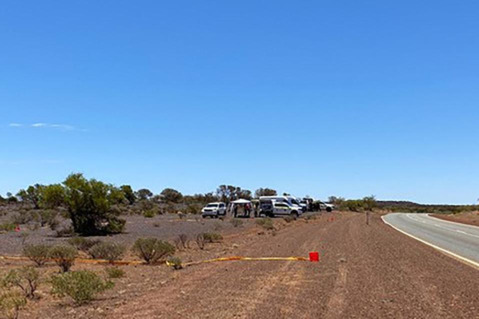 This handout from the Government of Western Australia's Department of Fire and Emergency Services taken and received on February 1, 2023 shows vehicles near the site where a radioactive capsule, which had fallen off a truck, was found along a desert highway south of Newman, Western Australia. - A tiny but dangerously radioactive capsule, which fell off a truck along a remote stretch of Outback highway in Western Australia last month, was found on February 1, authorities said.