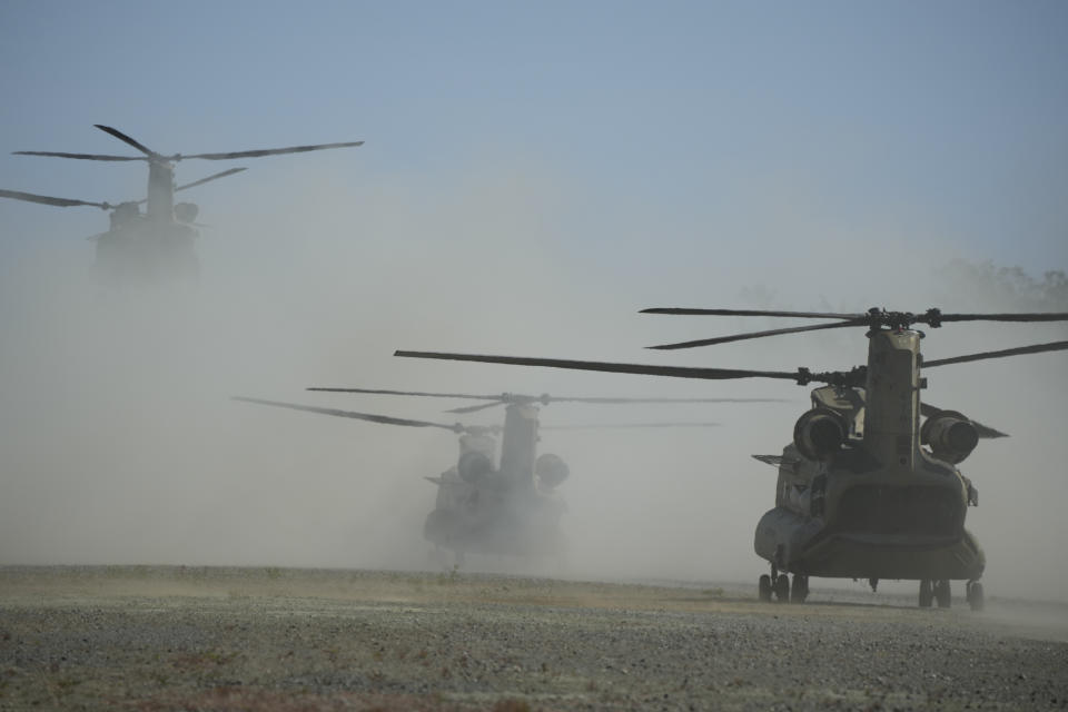 U.S. Army CH-47s takes off at Paredes Air Station at Pasuquin, Ilocos Norte province as it carries the U.S. and Philippine troops during a joint military exercise in northern Philippines on Monday, May 6, 2024. American and Filipino marines held annual combat-readiness exercises called Balikatan, Tagalog for shoulder-to-shoulder, in a show of allied battle readiness in the Philippines' northernmost island town of Itbayat along the strategic Bashi Channel off southern Taiwan. (AP Photo/Aaron Favila)