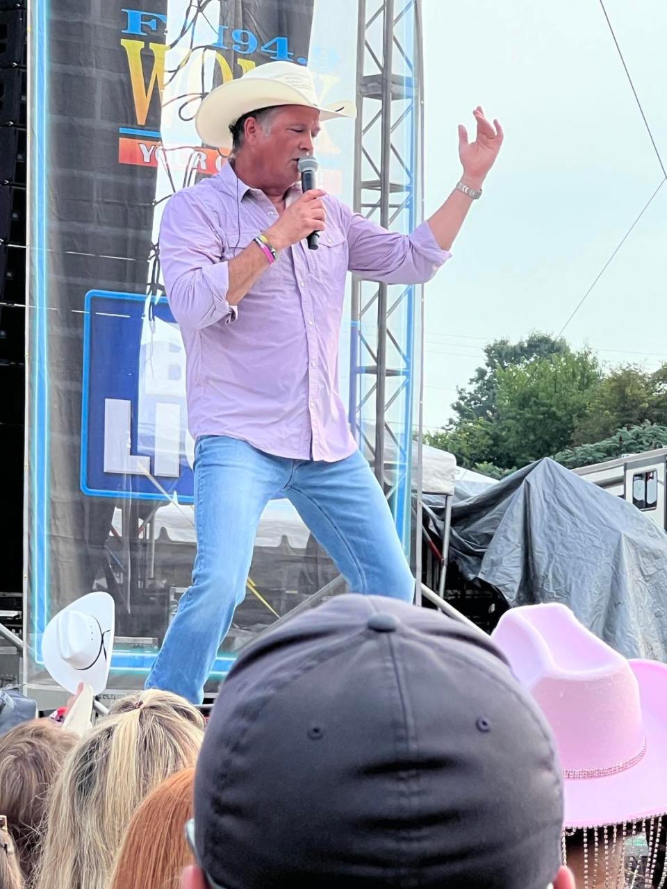 Tracy Byrd performs Friday during the Neon Nights country music festival. The event continues Saturday at Clay's Resort Jellystone Park in Lawrence Township in Stark County.