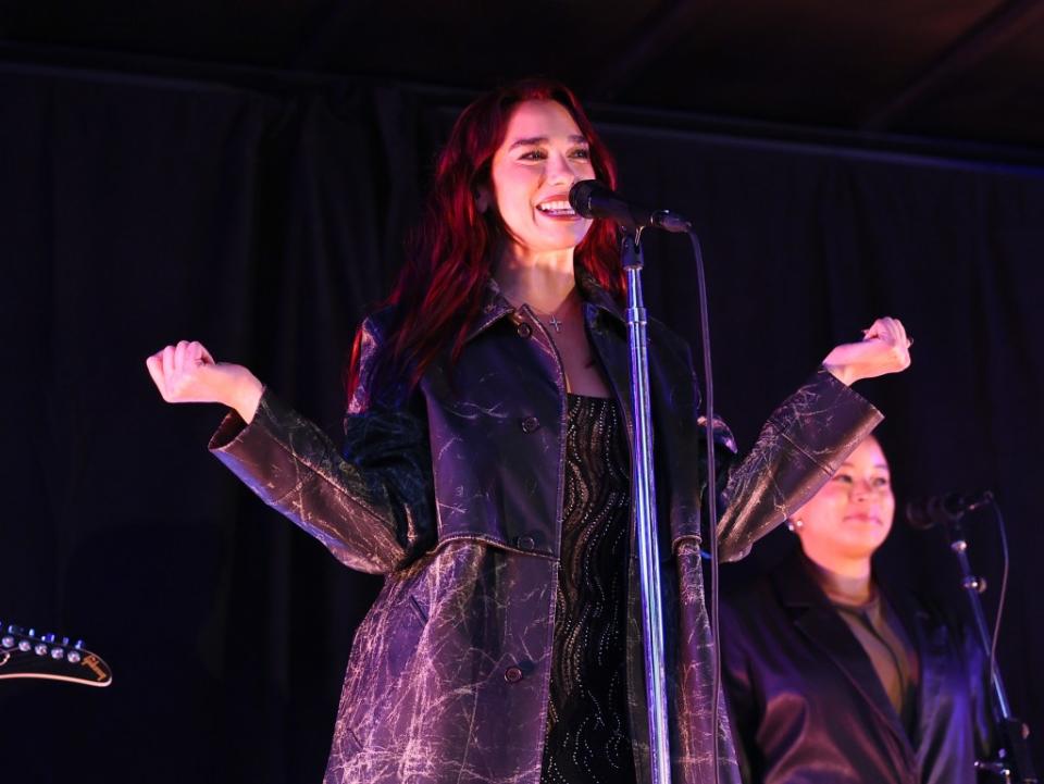 “Thank you for braving the rain and the cold,” Dupa Lipa told the crowd in Times Square on Sunday night. Getty Images