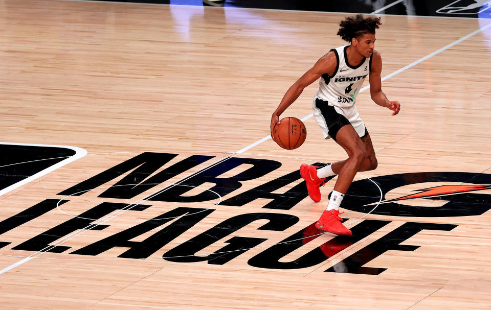 Jalen Green brings the ball up the floor during a G League game.