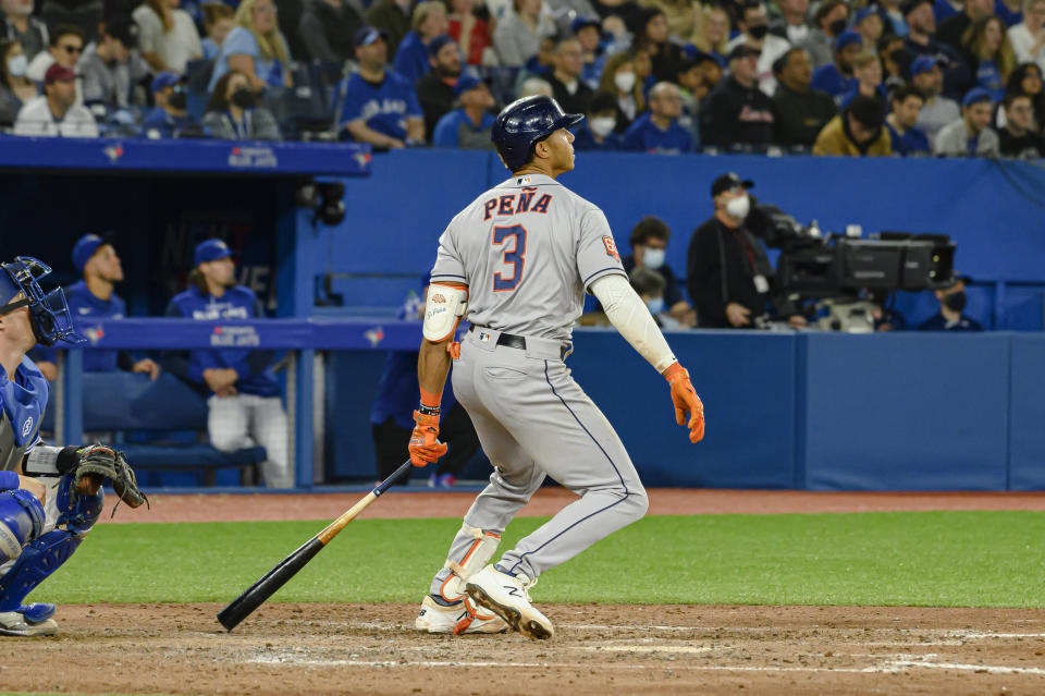 Houston Astros' Jeremy Pena (3) watches his home run against the Toronto Blue Jays during the sixth inning of a baseball game Friday, April 29, 2022, in Toronto. (Christopher Katsarov/The Canadian Press via AP)