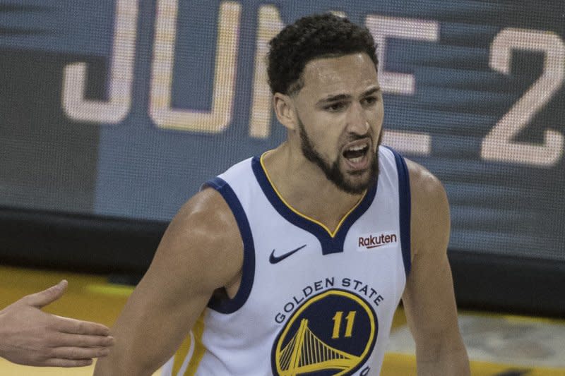 Klay Thompson (pictured), fellow Golden State Warriors guard Stephen Curry and forward Draymond Green did not play in the second half of a blowout loss to the Boston Celtics on Sunday in Boston. File Photo by Terry Schmitt/UPI