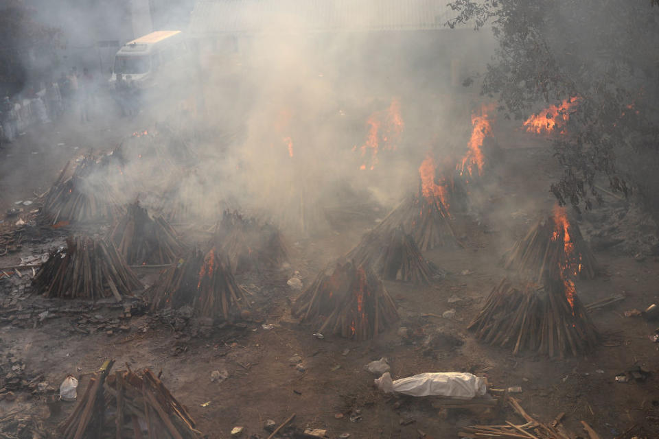 A body of a person who died from Covid at a crematorium in New Delhi.