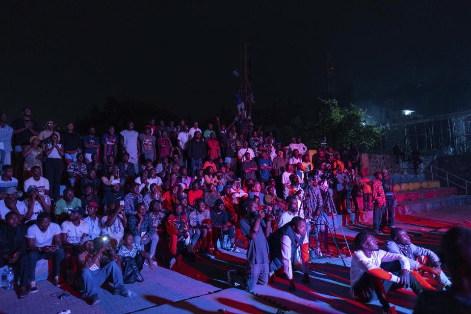 Spectators watch a dance performance in Goma, Democratic Republic of the Congo, Saturday, June 15, 2024, during the annual Goma Dance Festival. The annual festival, which sees dancers from all over the world flocking to Goma, has been held in the city for the past seven years despite the ongoing attacks by rebel groups in the region. (AP Photo/Moses Sawasawa)