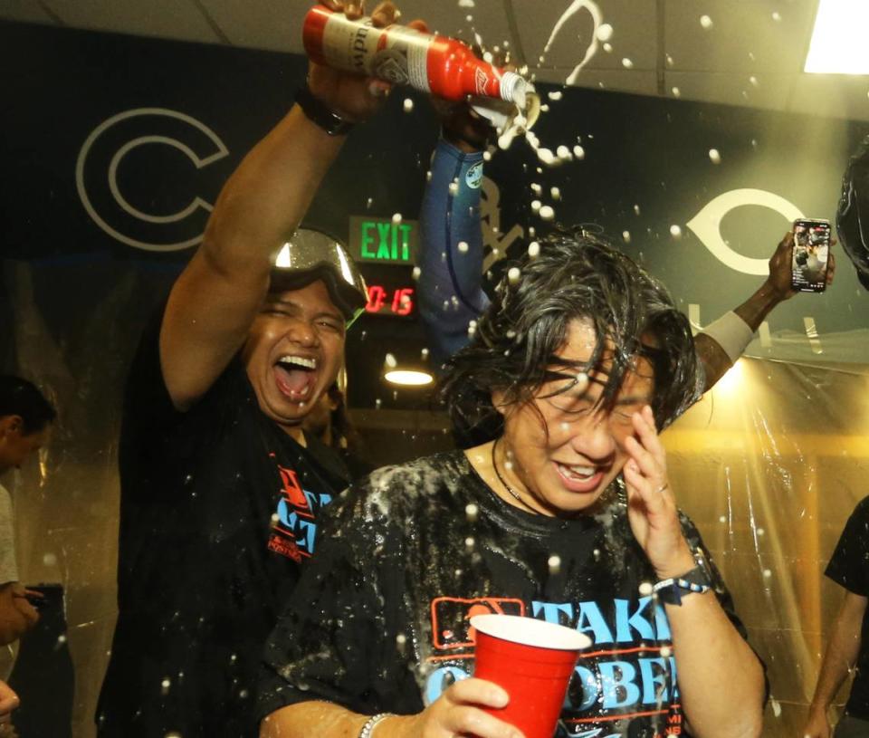 Sep 30, 2023; Pittsburgh, Pennsylvania, USA; Miami Marlins general manager Kim Ng (front) celebrates in the locker room after defeating the Pittsburgh Pirates at PNC Park to secure a berth in the 2023 MLB playoffs.