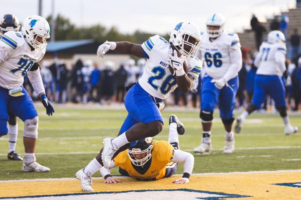 Seth Johnson finds the endzone against Mississippi College on November 12, 2022. Photo Credit: Morgan Givens/ UWF Athletics