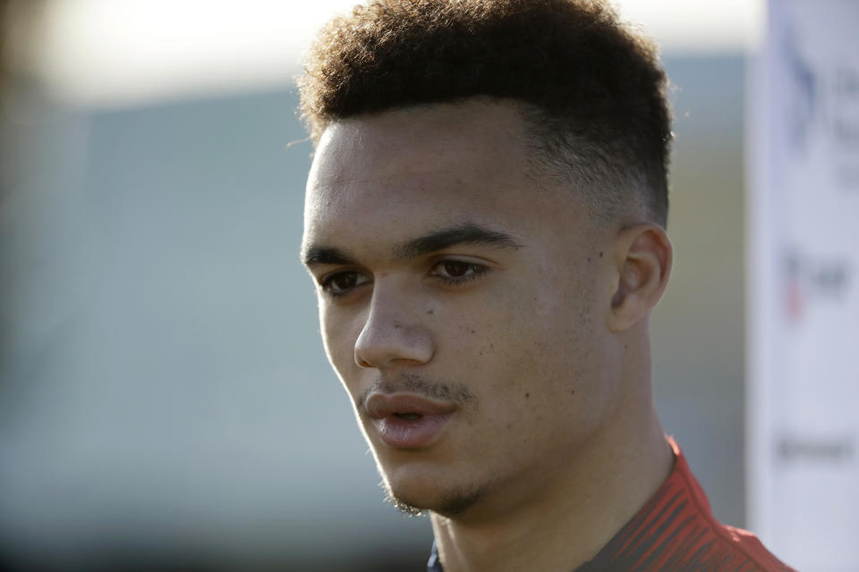 Antonee Robinson, still recovering from ankle surgery, won’t return to Wigan’s lineup until February. (AP/Matt Dunham)