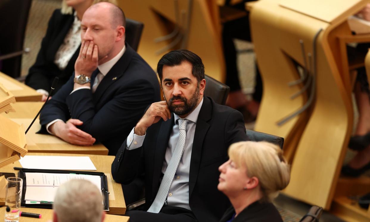 <span>Humza Yousaf and his front bench during the vote in Edinburgh. The motion was defeated by 70 votes to 58.</span><span>Photograph: Jeff J Mitchell/Getty Images</span>