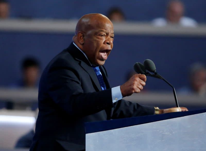 FILE PHOTO: Rep. John Lewis gestures as he nominates Hillary Clinton at the Democratic National Convention in Philadelphia, Pennsylvania