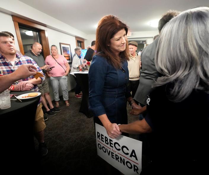 Wisconsin Republican governor candidate Rebecca Kleefisch talks to supporters prior to speaking at the Cornerstone Sports Pub in Oconomowoc on Tuesday, Aug. 9, 2022.