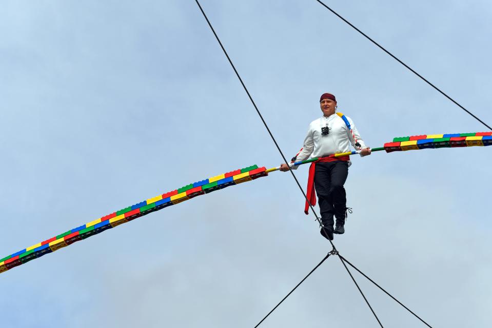 Nik Wallenda walking a high wire at Legoland Florida Resort in Winter Haven in 2020. He will be performing in Sarasota in a circus show he is producing with the Circus Arts Conservatory, "A Brave New Wonderland."