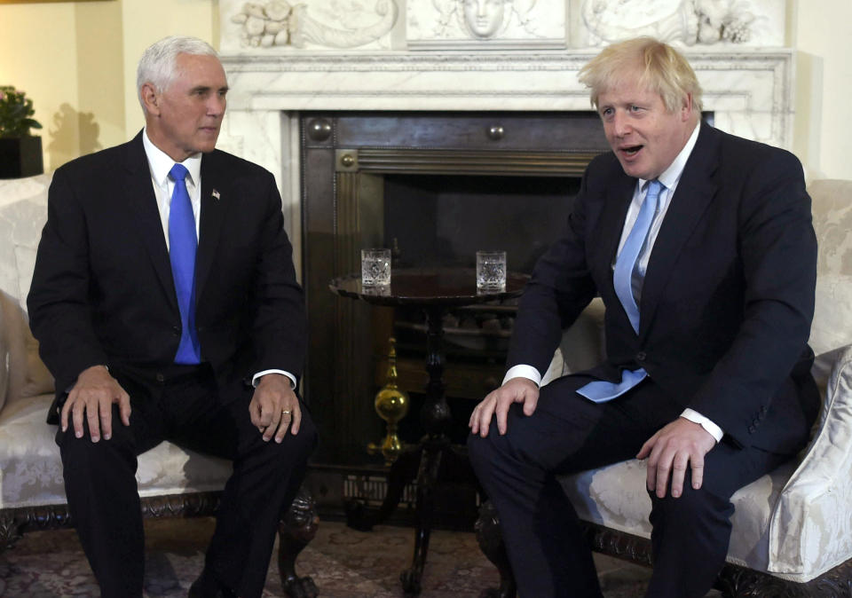 Britain's Prime Minister Boris Johnson, right, meets with US Vice President Mike Pence inside 10 Downing Street in London, Thursday, Sept. 5, 2019. (Peter Summers/Pool photos via AP)