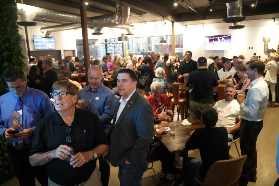 Supporters of Tempe's proposal to build a new Coyotes arena in the city react to the news on May 16, 2023, that Propositions 301, 302 and 303 are likely not to pass, blocking the land use for the development.