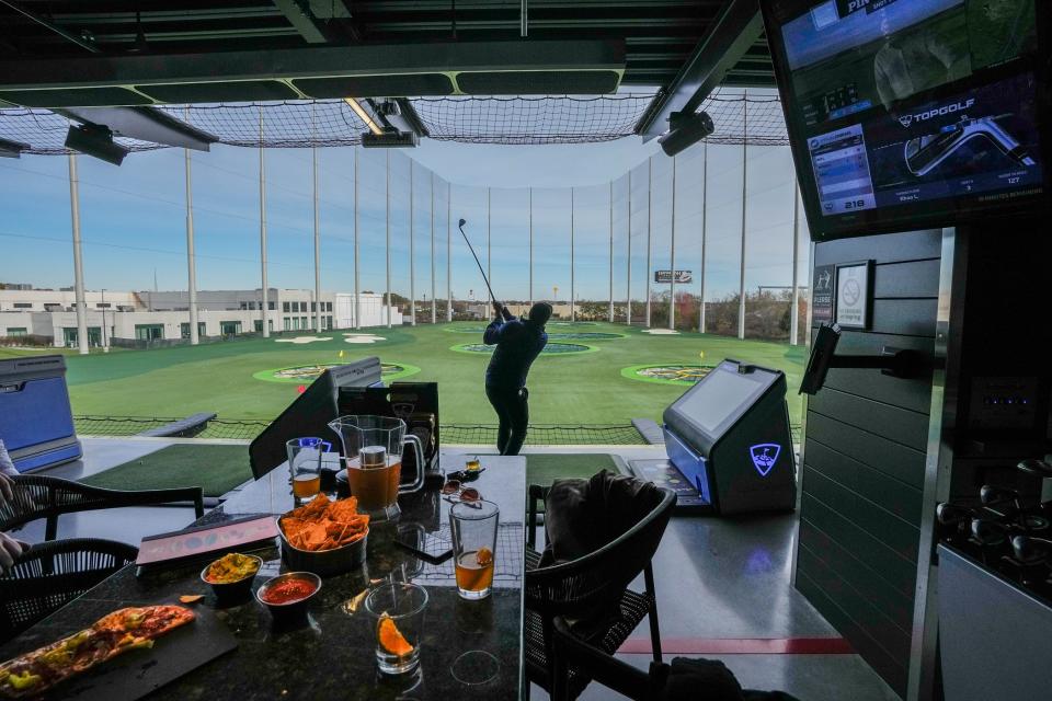 Topgolf driving range in Cranston. Nachos, beer and golf on a Wednesday afternoon.