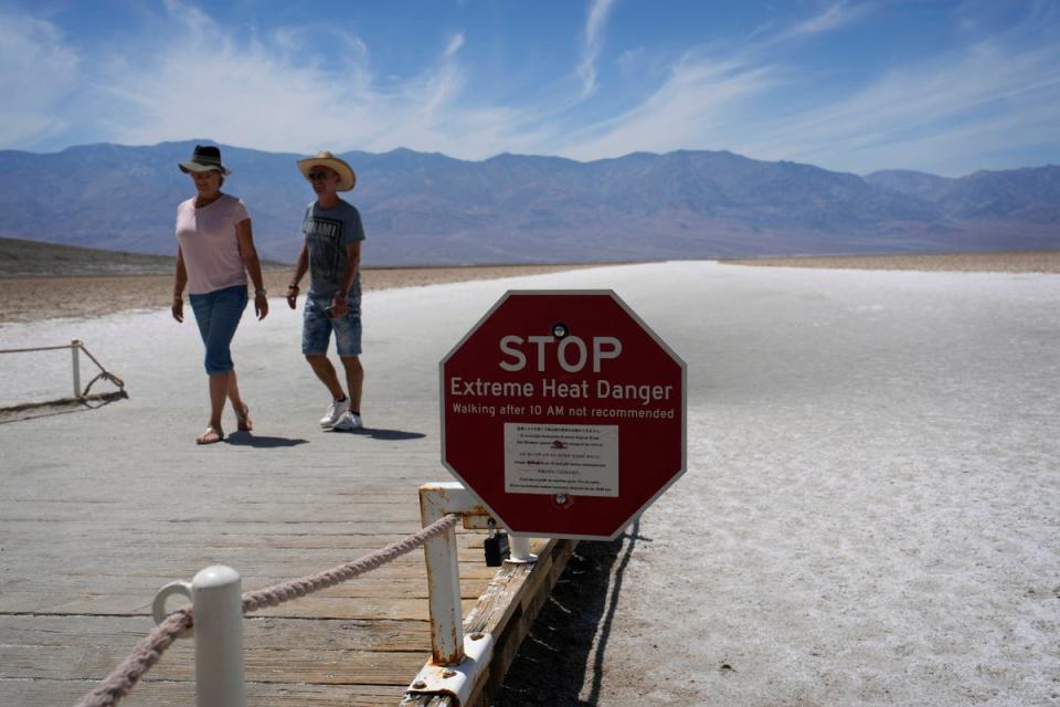 A sign warns visitors of extreme heat danger at Badwater Basin. Several motorcyclists had to be treated on Saturday for heat exposure (Copyright 2023 The Associated Press. All rights reserved.)