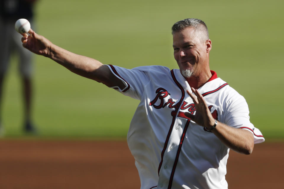 Former Atlanta Braves player and MLB Hall of Fame baseball player Chipper Jones throws the a ceremonial pitch ahead of Game 1 of a best-of-five National League Division Series between the Atlanta Braves and the St. Louis Cardinals, Thursday, Oct. 3, 2019, in Atlanta. (AP Photo/John Bazemore)