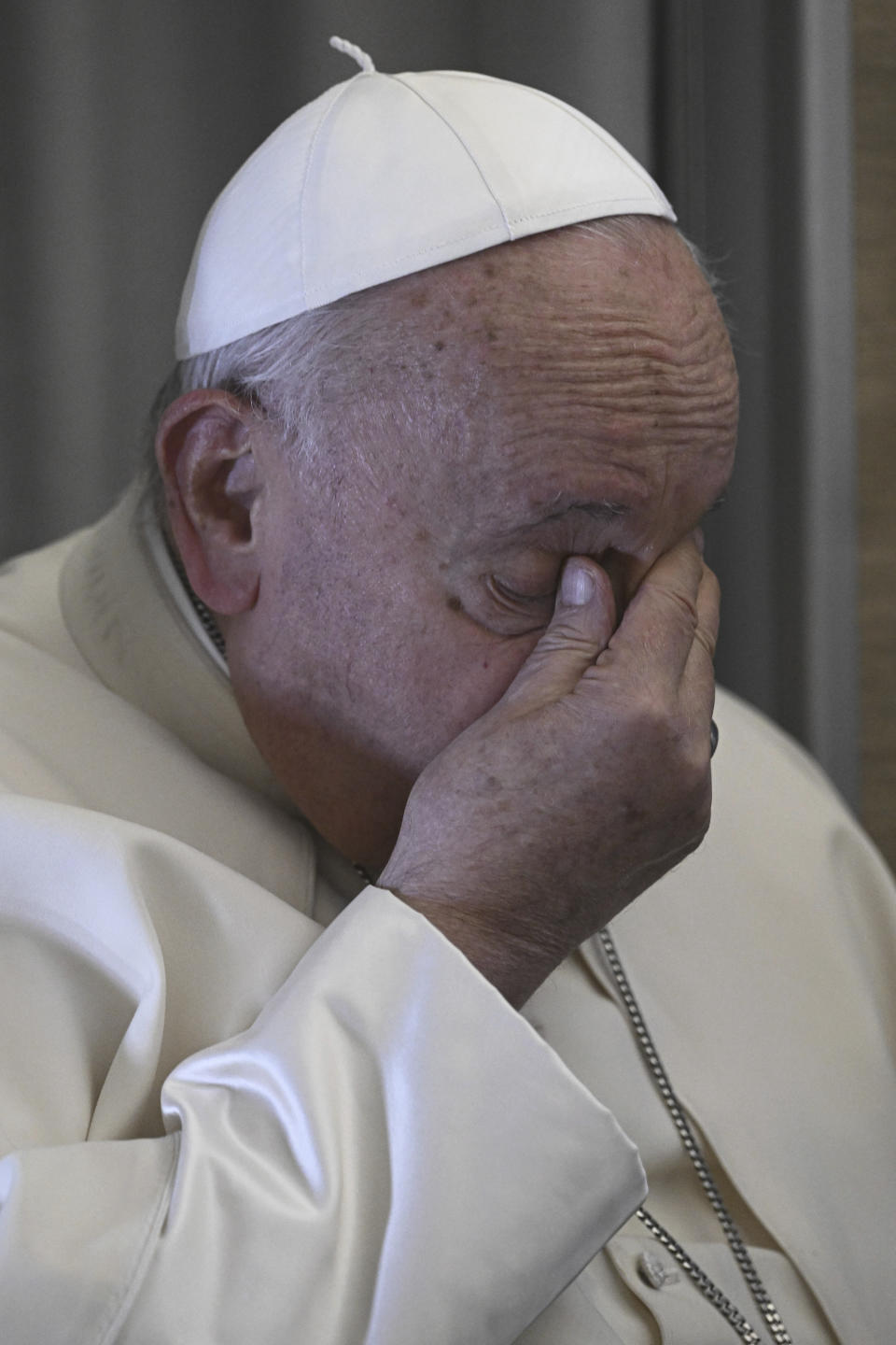 Pope Francis talks to reporters during the return flight from Ulaanbaatar, Mongolia, Monday, Sept. 4, 2023, at the end of a historic four-day visit to a region where the Holy See has long sought to make inroads. (Ciro Fusco/ANSA via AP, Pool)