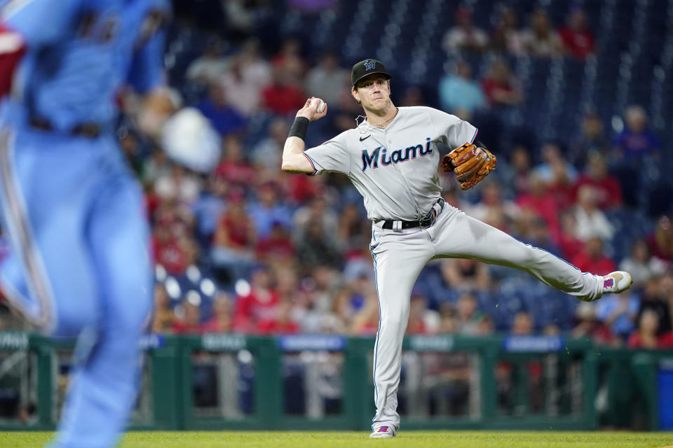 Miami Marlins third baseman Brian Anderson throws to first after fielding a ground out by Philadelphia Phillies' Brandon Marsh during the fifth inning of a baseball game, Thursday, Sept. 8, 2022, in Philadelphia. (AP Photo/Matt Slocum)