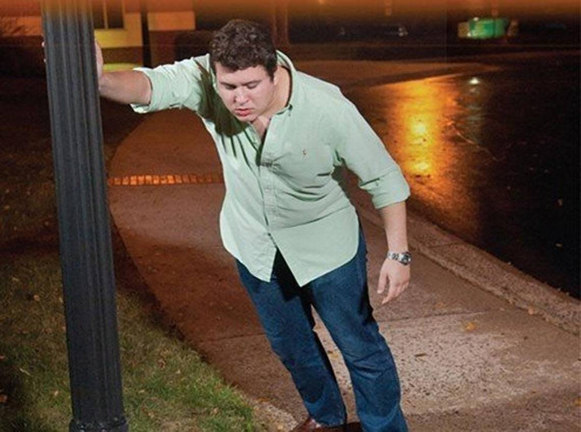 Image from a 2015 controversial ad run on the back pages of the North Raleigh News and Midtown Raleigh News, community papers owned by The News & Observer. The ad showed a young, drunken-looking man leaning on a lamp post as if he might vomit, and the text suggested that Raleigh councilwoman Mary-Ann Baldwin wanted to turn downtown Raleigh into “DrunkTown.”