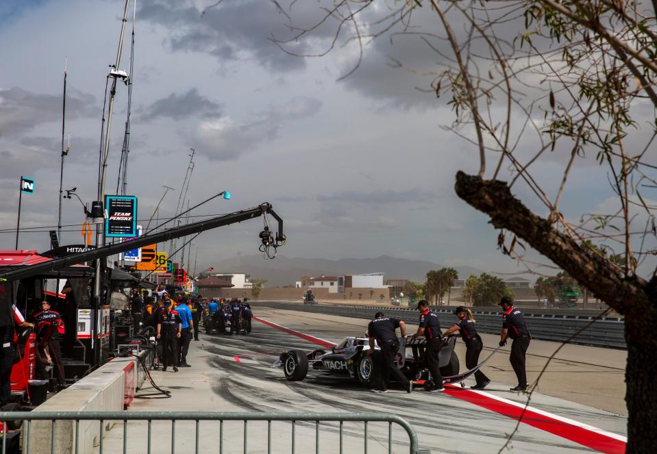 The Hitachi Team Penske Chevrolet of Josef Newgarden is pushed out of the pits at the end of the fourth and final test session of the $1 Million Challenge at The Thermal Club in Thermal, Calif., Saturday, March 23, 2024.