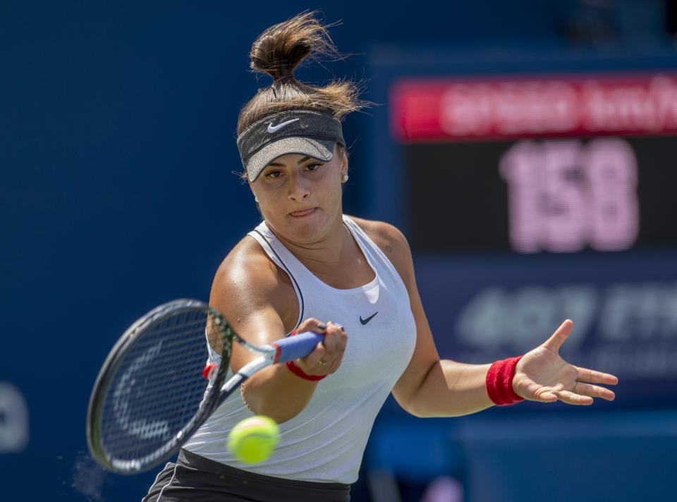 Bianca Andreescu, of Canada, hits a forehand to Sofia Kenin, of the United States during the Rogers Cup women’s tennis tournament Saturday, Aug. 10, 2019, in Toronto. (Frank Gunn/The Canadian Press via AP)