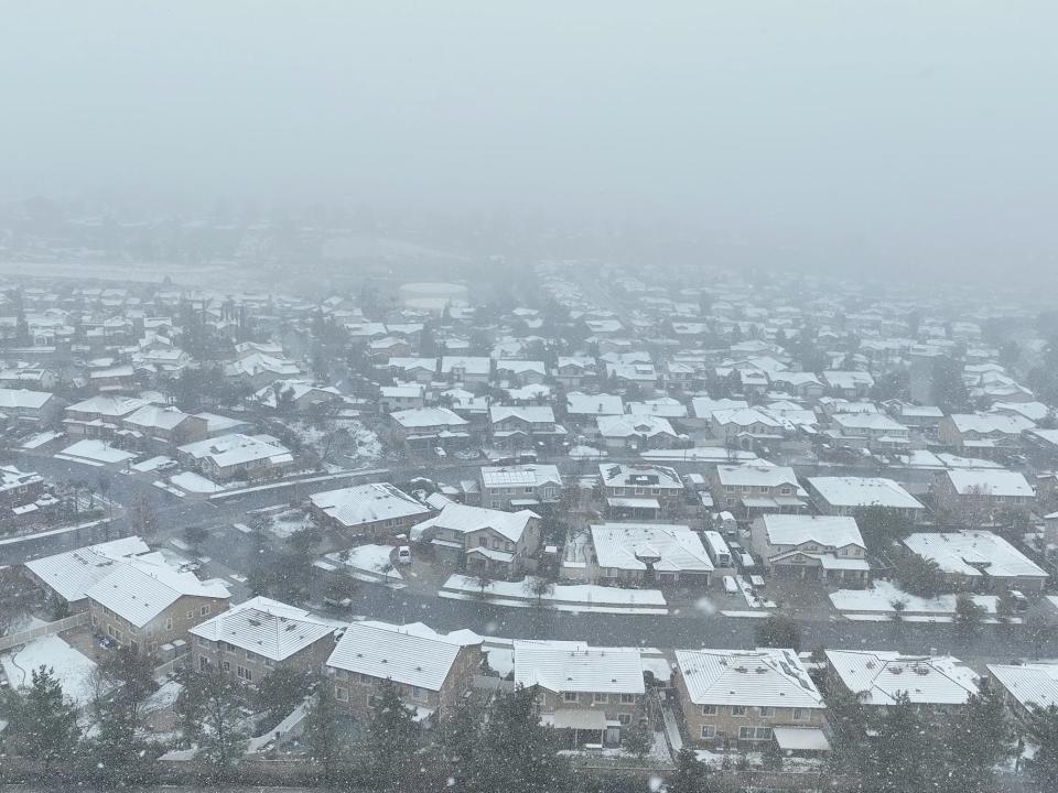 Snow and fog cover the homes of Yucaipa, California.