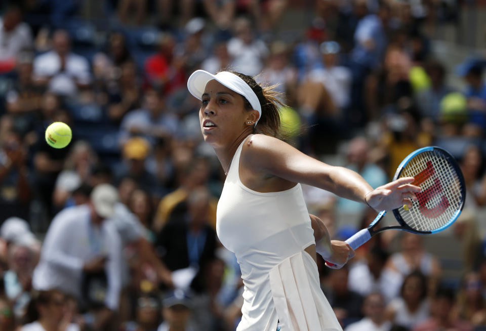 Madison Keys returns a shot to Aleksandra Krunic, of Serbia, during the third round of the U.S. Open tennis tournament, Saturday, Sept. 1, 2018, in New York. (AP Photo/Jason DeCrow)