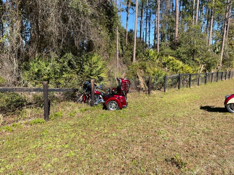 A Harley Davidson motorcycle crashed into a wooden wire fence on Tuesday