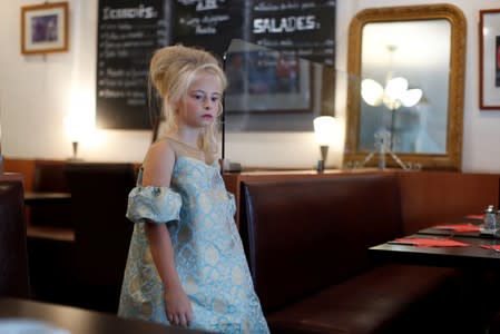 Model Daisy-May Demetre, 9 year-old double amputee who will walk the runway during Paris Fashion Week, during a photo shoot a day before the luxury children's wear label Lulu et Gigi show in Paris