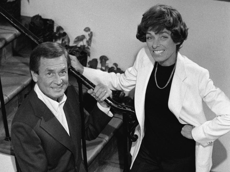 Bob Barker and his wife Dorothy Jo (1824 - 1981) pose on the stairs of their house, November 4, 1977