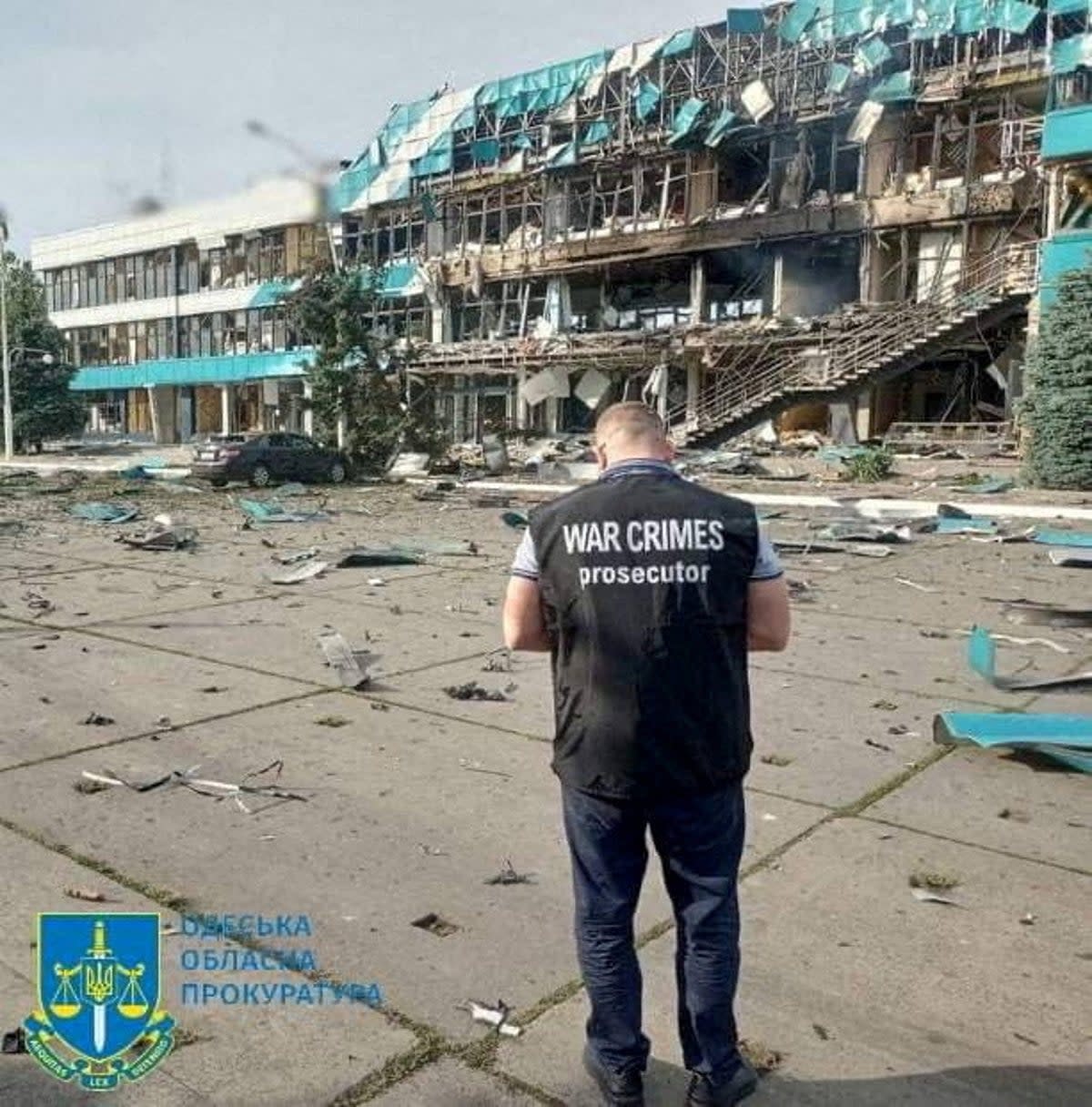 An inspector surveys the damage at a grain port facility in, Izmail, southern Ukraine (via REUTERS)