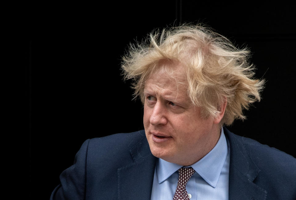 LONDON, ENGLAND - JUNE 03: British Prime Minister, Boris Johnson leaves Downing Street to attend Prime Ministers Questions at the Houses of Parliament on June 3, 2020 in London, England. Dominic Cummings, chief advisor to the prime minister, came under scrutiny after allegedly breaching lockdown rules and subsequently having to issue a statement to the British public from the garden of Downing Street. (Photo by Chris J Ratcliffe/Getty Images)