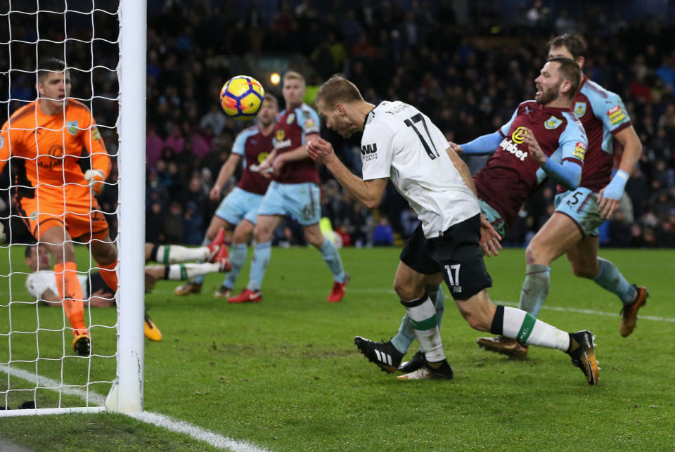 Ragnar Klavan heads in Liverpool’s winner at Burnley on Monday. (Getty)