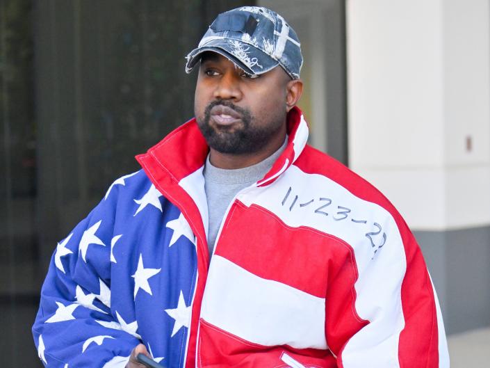 Kanye West in stars and stripes jacket