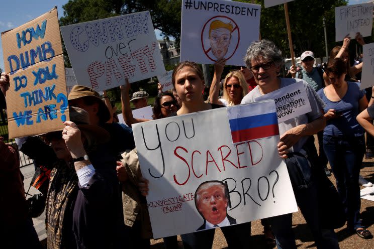 Protesters gather to rally outside the White House against President Trump’s firing of FBI Director James Comey. (Photo: Jonathan Ernst/Reuters)