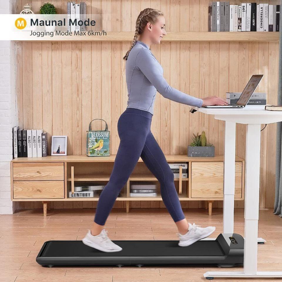 <div><p>"A walking desk can eliminate the block of going to the gym," Chlipala said. "I talk with my clients about lowering their expectations, whether it's the number of tasks they can accomplish in one day to what they can do for their self-care. So if a high-intensity workout is too much to consider, you can still get some benefits from exercise by walking."HuffPost Wellness editor <a href="https://www.huffpost.com/author/lindsay-holmes" rel="nofollow noopener" target="_blank" data-ylk="slk:Lindsay Holmes;elm:context_link;itc:0;sec:content-canvas" class="link ">Lindsay Holmes</a> loves her <a href="https://www.huffpost.com/entry/under-desk-treadmill_l_62e7ed88e4b006483a9fda01" rel="nofollow noopener" target="_blank" data-ylk="slk:Walkingpad folding treadmill;elm:context_link;itc:0;sec:content-canvas" class="link ">Walkingpad folding treadmill</a>, which fits nicely under a desk or couch and is notably noise free. </p><p><i>You can buy the <a href="https://www.amazon.com/WALKINGPAD-Treadmill-Foldable-Installation-0-3-72MPH/dp/B0983LLR7Y" rel="nofollow noopener" target="_blank" data-ylk="slk:foldable, under desk treadmill;elm:context_link;itc:0;sec:content-canvas" class="link ">foldable, under desk treadmill</a> from Amazon for $489-$499. </i></p></div><span> Amazon</span>