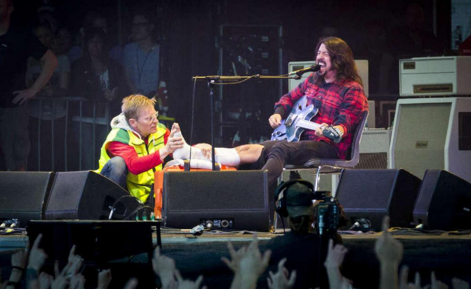 Dave continued performing as a Swedish medic tended to his broken leg. Copyright: [Rex]