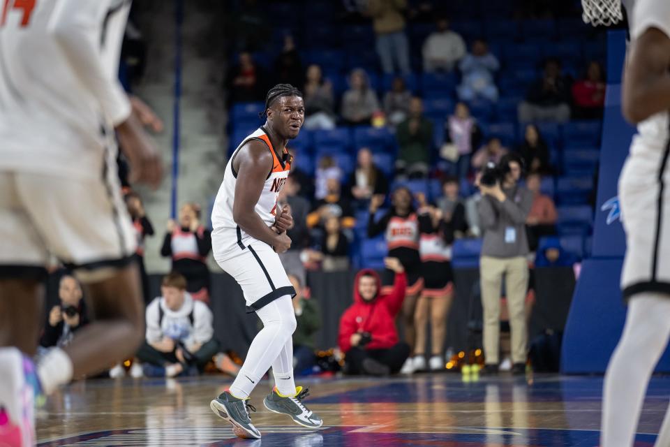 North's Khari Bryan celebrates versus Franklin during the D1 state championship at the Tsongas Center.